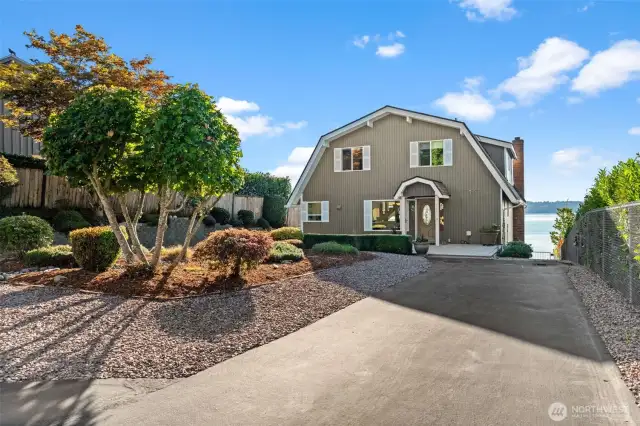 This property features a spacious primary home on the water’s edge, complemented by a charming 1-bedroom, 1-bath ADU.