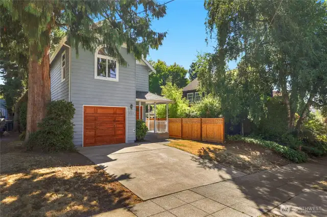 Spacious driveway and sidewalk.