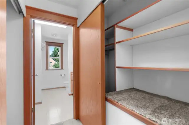 2nd floor primary bathroom with two side closets and bath.