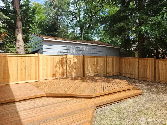 Custom deck with new fence.