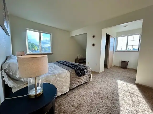 Primary bedroom is at top of stairs.