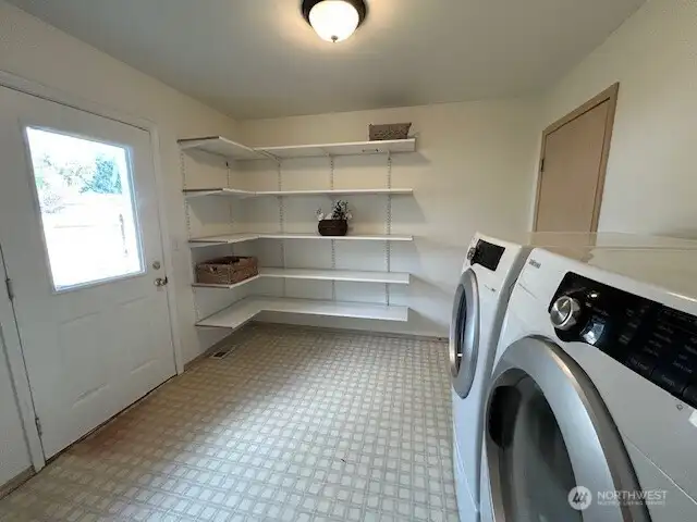 Laundry room also open to back yard and patio.