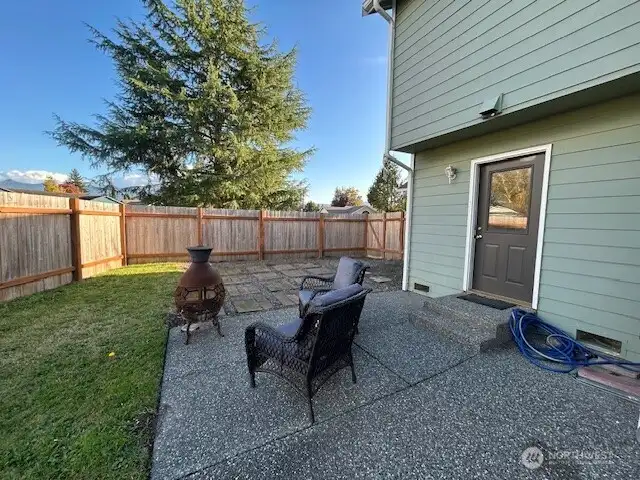 Back patio access to laundry room.