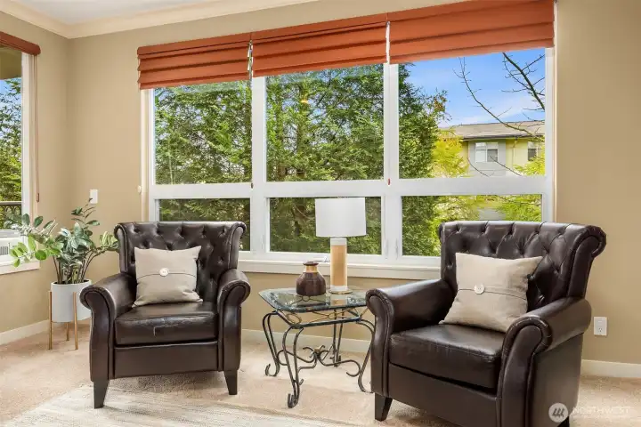 Large bay windows offering natural light