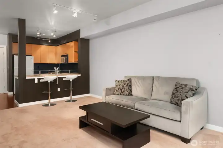 Living room with space for dining table as well.