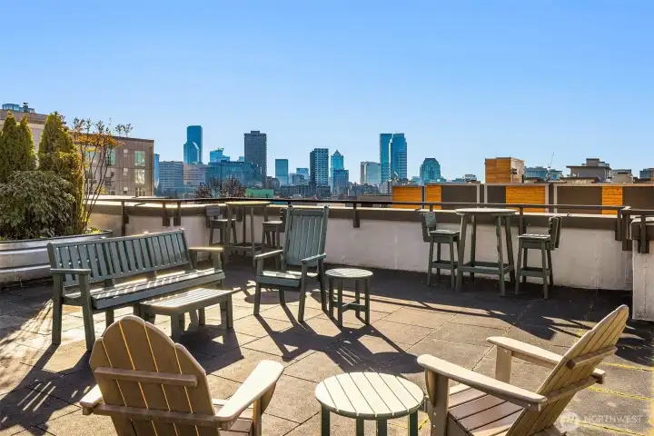 View from West building rooftop deck. Lots of seating and a gas grill for cooking. The building has a total of 5 rooftop decks.