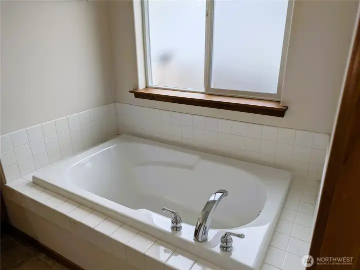 Soaking tub in teh Primary Bathroom