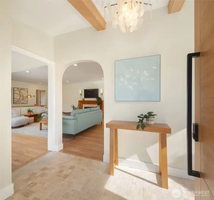 Front entry opening to light-filled living space.