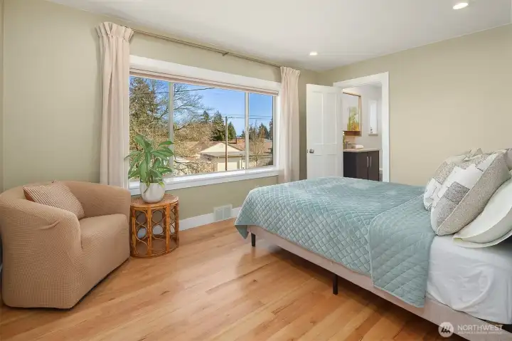 Primary bedroom with ensuite bathroom.