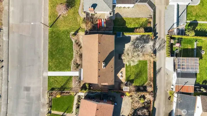 Birds eye view of home showcasing alley access.