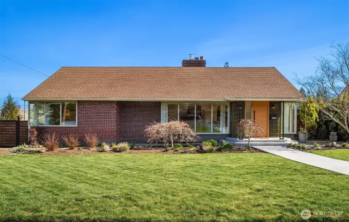 Paved walkway leading to front of the home.