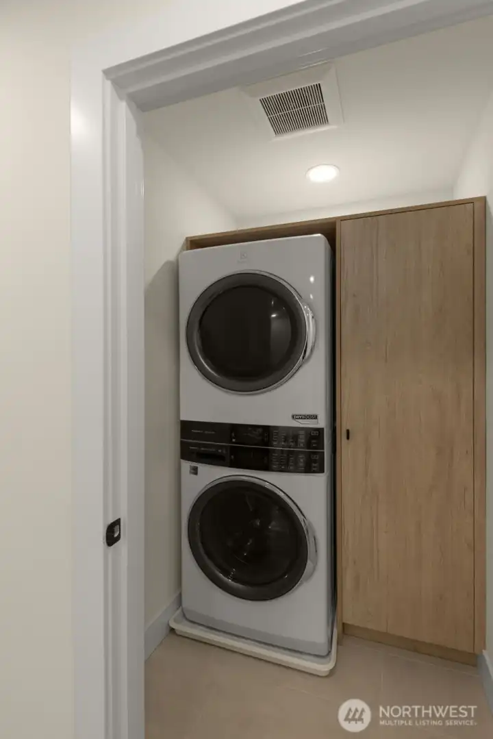Stacked washer and dryer.