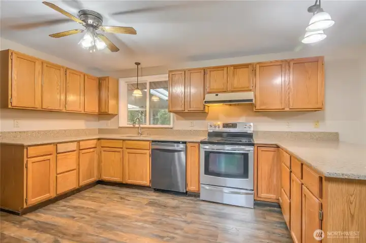 Kitchen showcasing updated granite counters