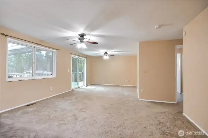 Family room with guest bath and garage exit on the right