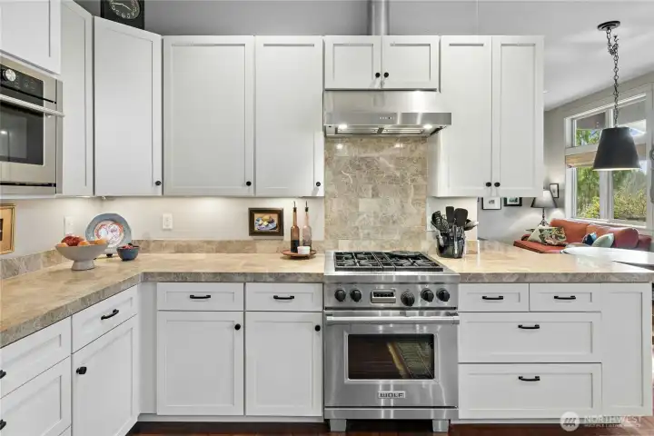 Counterspace and cabinets galore in this well planned out kitchen.