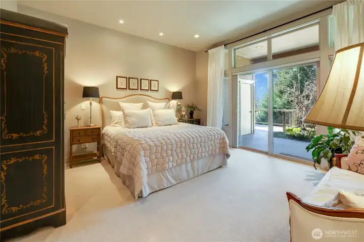 A very spacious Primary Bedroom has doors to a private patio and a beautiful ensuite bathroom and large walk in closet.