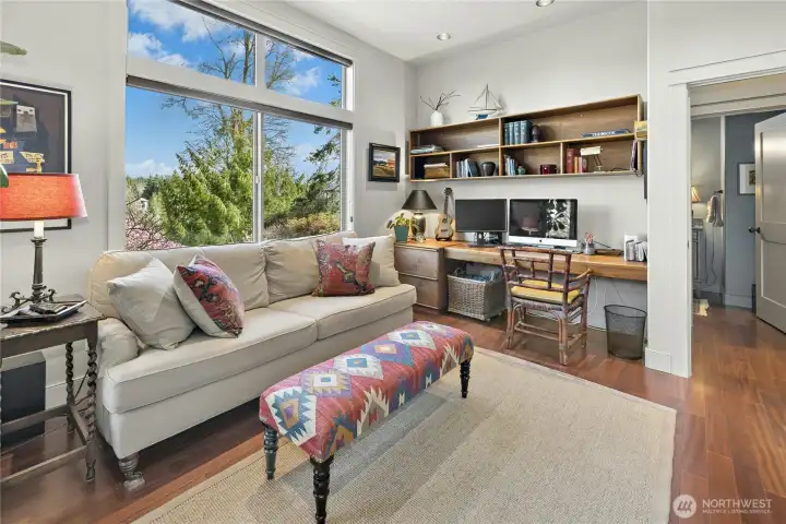 The desk area is in the space where a closet could go if needed.