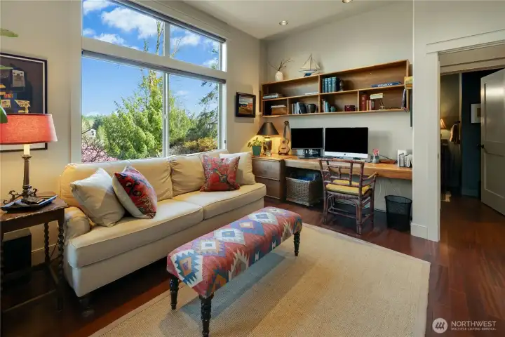The desk area is in the space where a closet could go if needed.