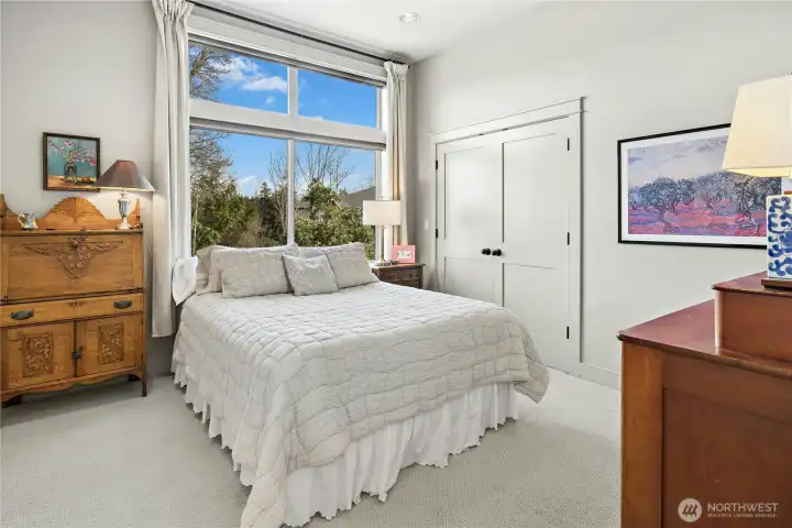 The Second Bedroom has great morning sun and an en-suite 3/4 bath.