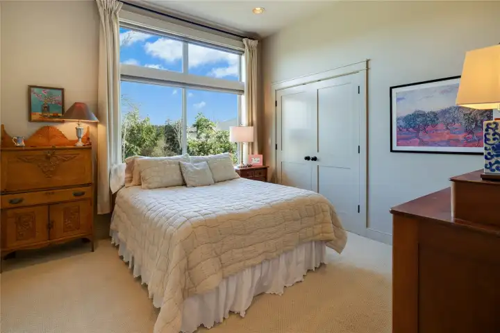 The Second Bedroom has great morning sun and an en-suite 3/4 bath.