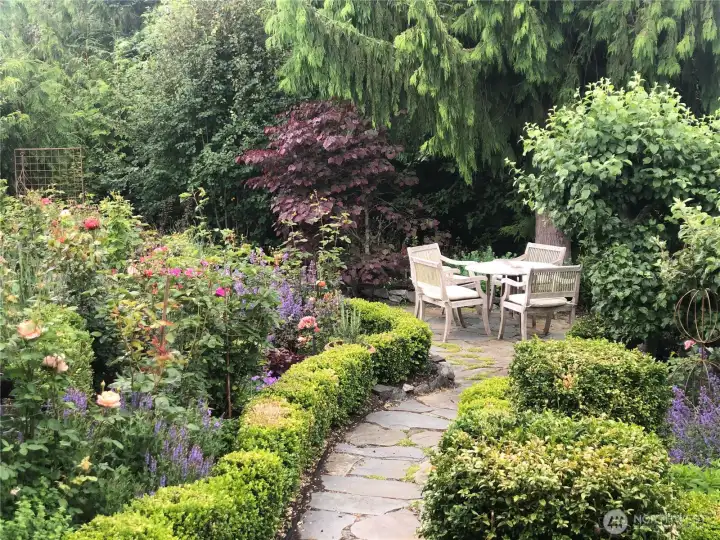 garden in bloom to private seating area