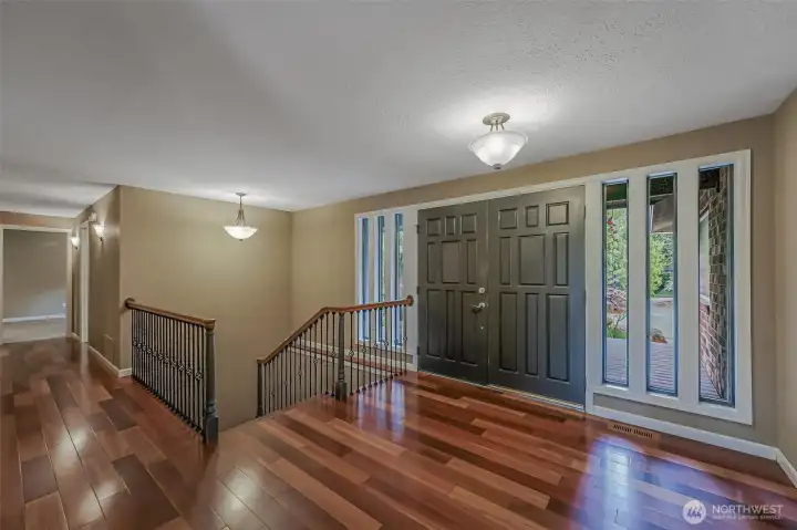 Light-filled entry welcomes you into this thoughtfully designed home.