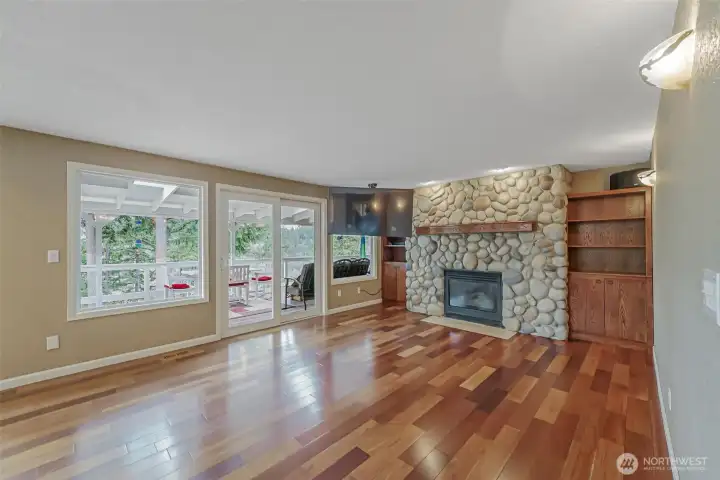 Bright and open living room with large windows and abundant natural light.