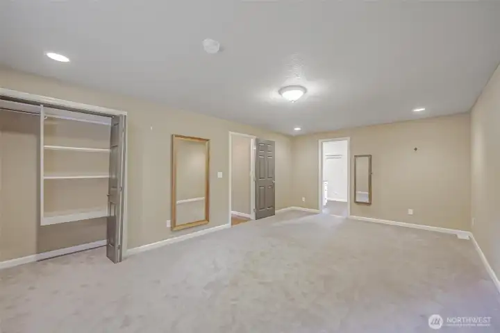 Primary suite offers a peaceful space with plenty of room to relax.