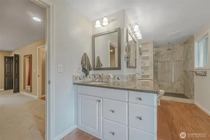 Primary bathroom offering convenience and comfort.