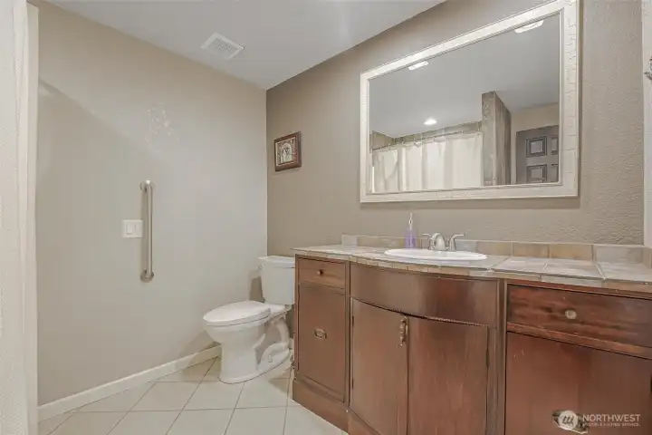 Main floor bath with modern touches.