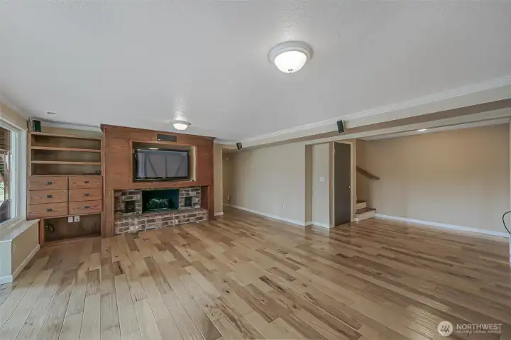 Down stairs where you will find additional living area perfect for flexible use.