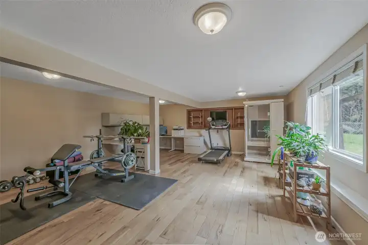 Versatile space ideal for a home office, gym, or media room.