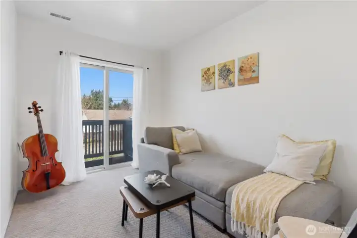 Guest bedroom 1 has its own private balcony. Would also make a great home office.