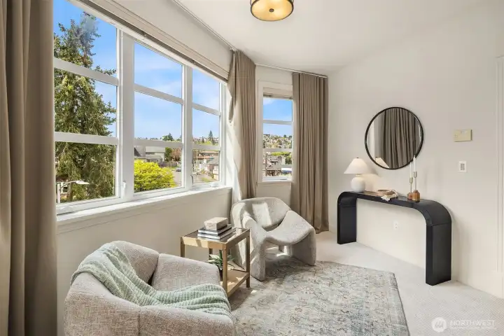 Generous primary room with sitting area