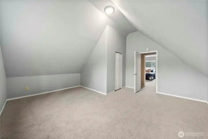Bedroom with vaulted ceilings upstairs