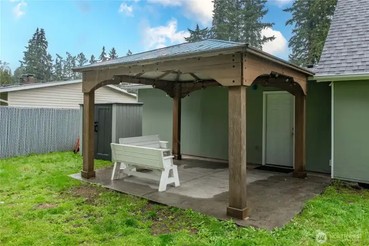 Garage door leads to backyard
