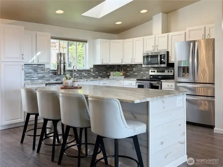 Massive island with luxurious bar seating