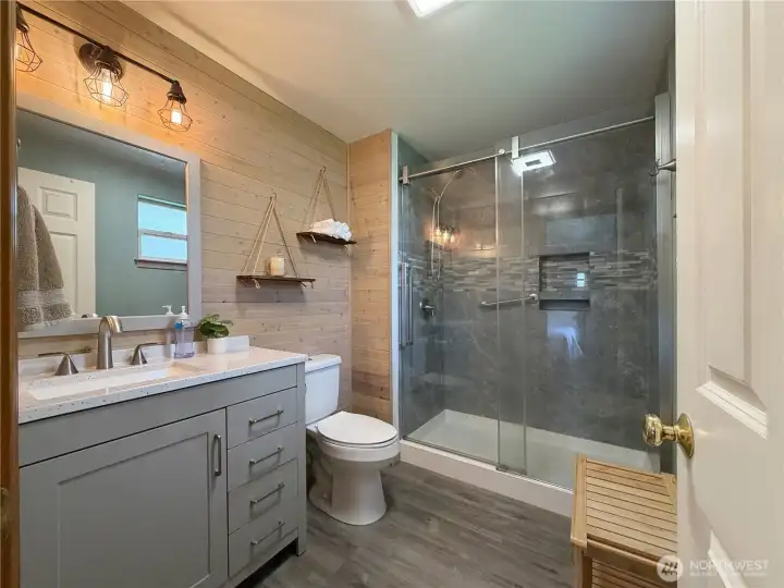Lovely primary bath with high quality upgrades and walk-in shower