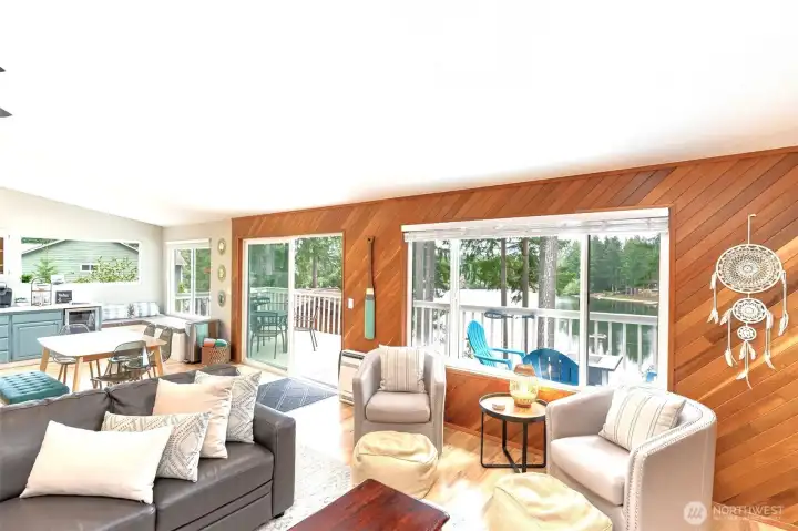 Great room interior on main floor (level entry) with walls of windows to big lake views!