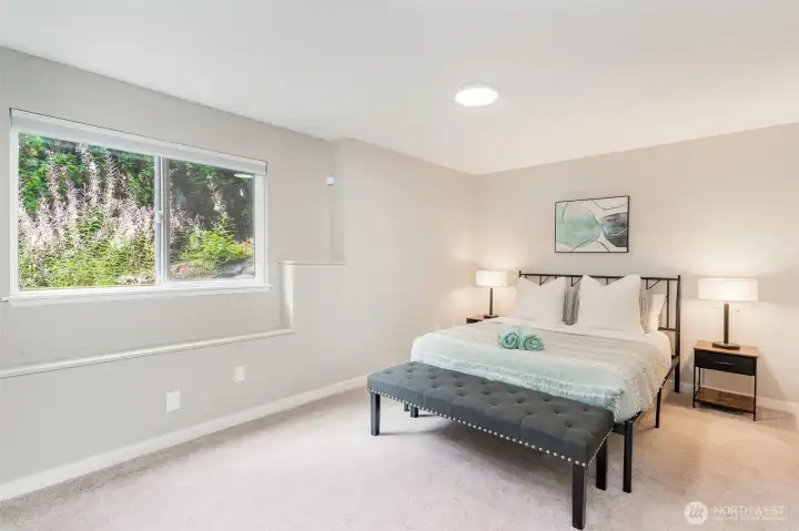 Bedroom #3 downstairs with walk-in closet and 3/4 bathroom attached