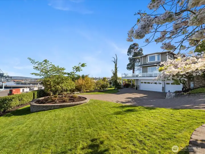Perfectly manicured lawn, fruit trees and bushes