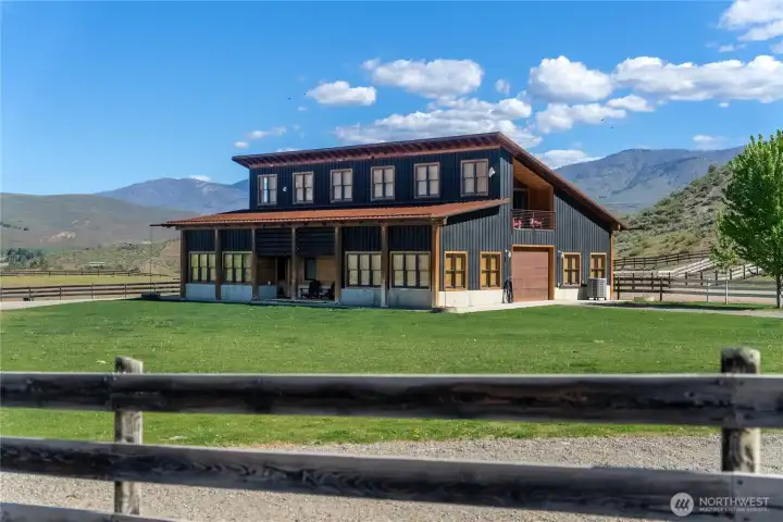 Remarkable multi-use contemporary barn on 20 view acres.