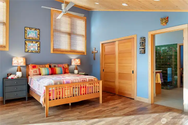 The bedroom is also reached by a hallway at the top of the stairs.