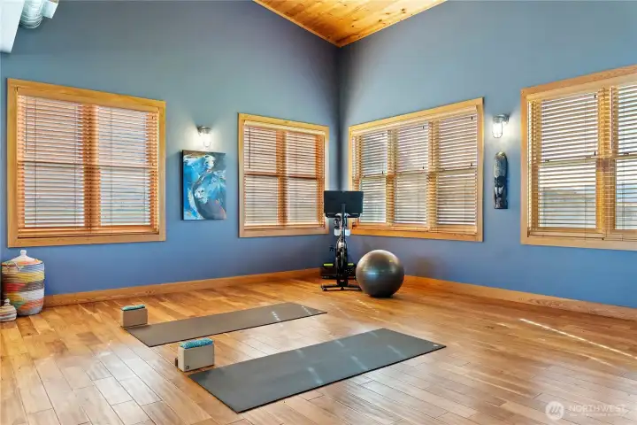 Downstairs, the barn residence has two incredible workout rooms, including one for yoga.