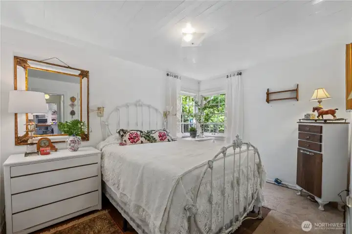 Bright and spacious second main-level bedroom, perfect for guests or a home office.