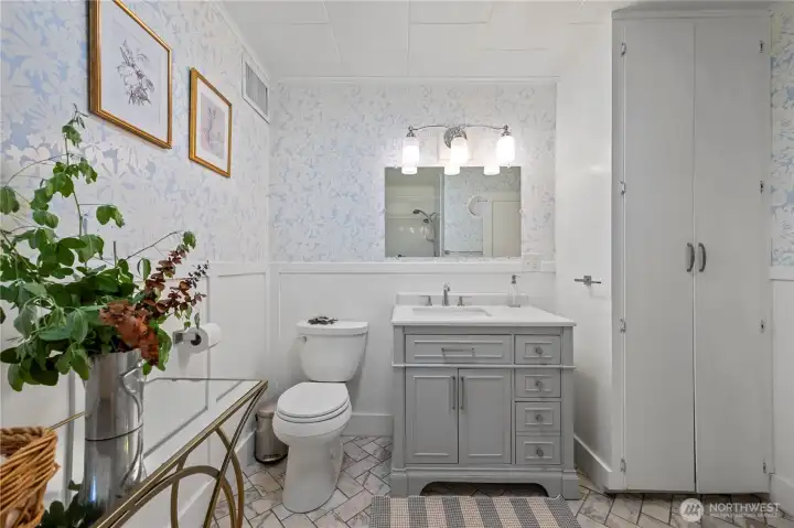 Fully updated and renovated main-level bathroom boasting large, modern fixtures and layouts