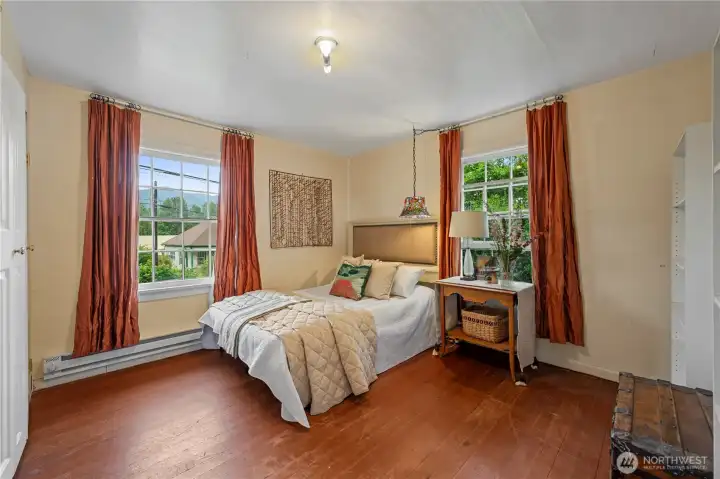 Bright and spacious second main-level bedroom, perfect for guests or a home office.