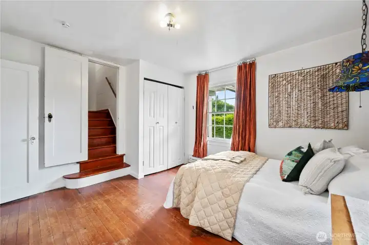 Larger room with Partial views and wood stairs to updstairs