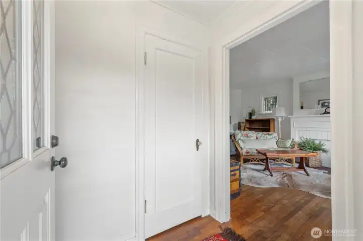 FRONT DOOR ENTRY WITH DOOR TO STORAGE UNDER STAIRS