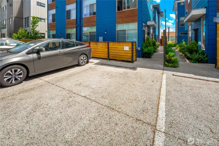 Parking space for unit 8027D. Your front door is just a few feet down the pathway.